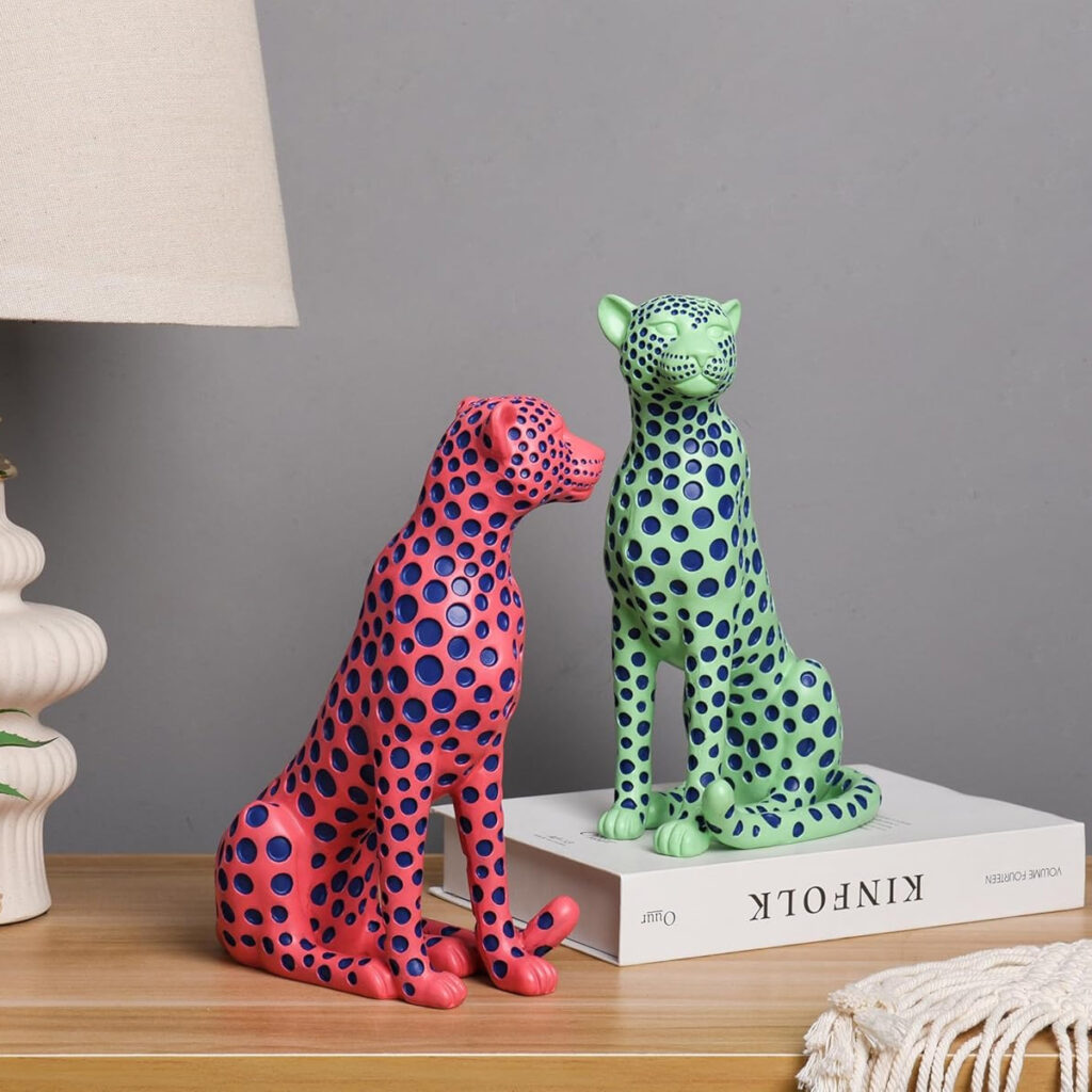 pink and green leopard sculptures decor